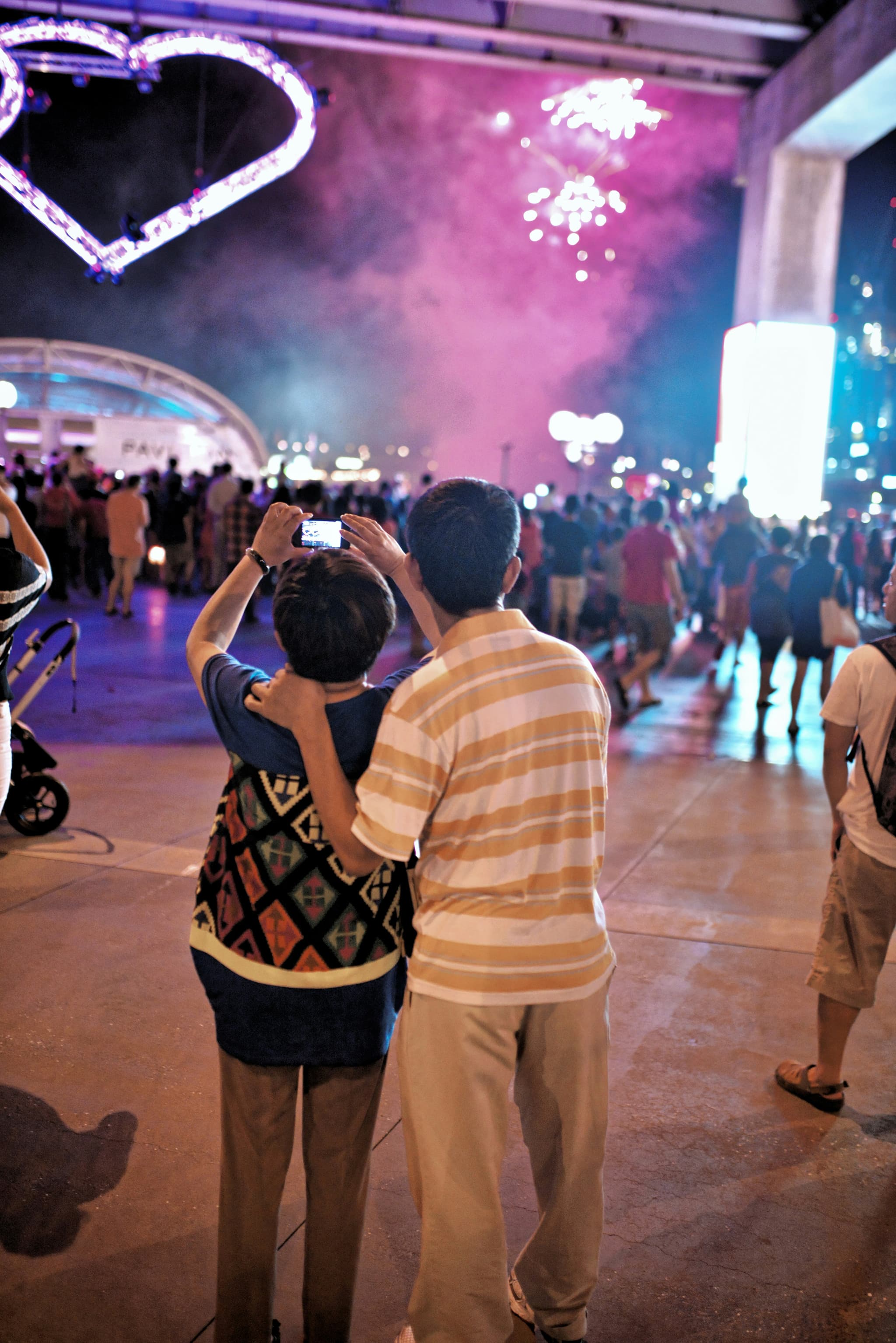 Guests contributing to a live Chakap event gallery from their phones